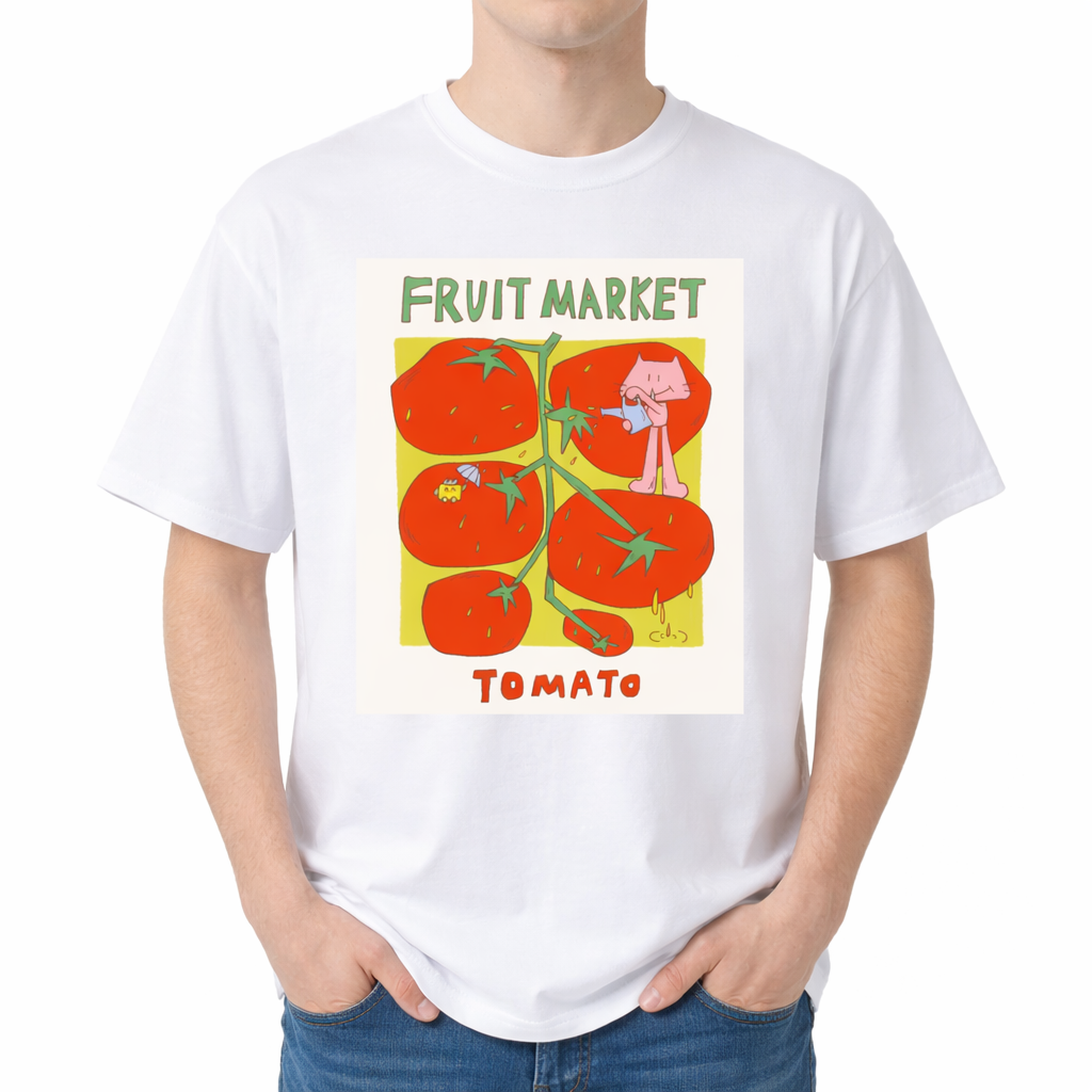 White t-shirt with tomato graphic and 'Fruit Market Tomato' text on a white background. The center features a colorful graphic with the text "FRUIT MARKET" at the top in green, hand-drawn letters. Below it is a light green square containing illustrations of a vine with five large, bright red tomatoes. A cute pink cartoon cat stands on one of the tomatoes, pouring water from a small blue watering can. Another tomato features a tiny yellow creature holding a blue umbrella