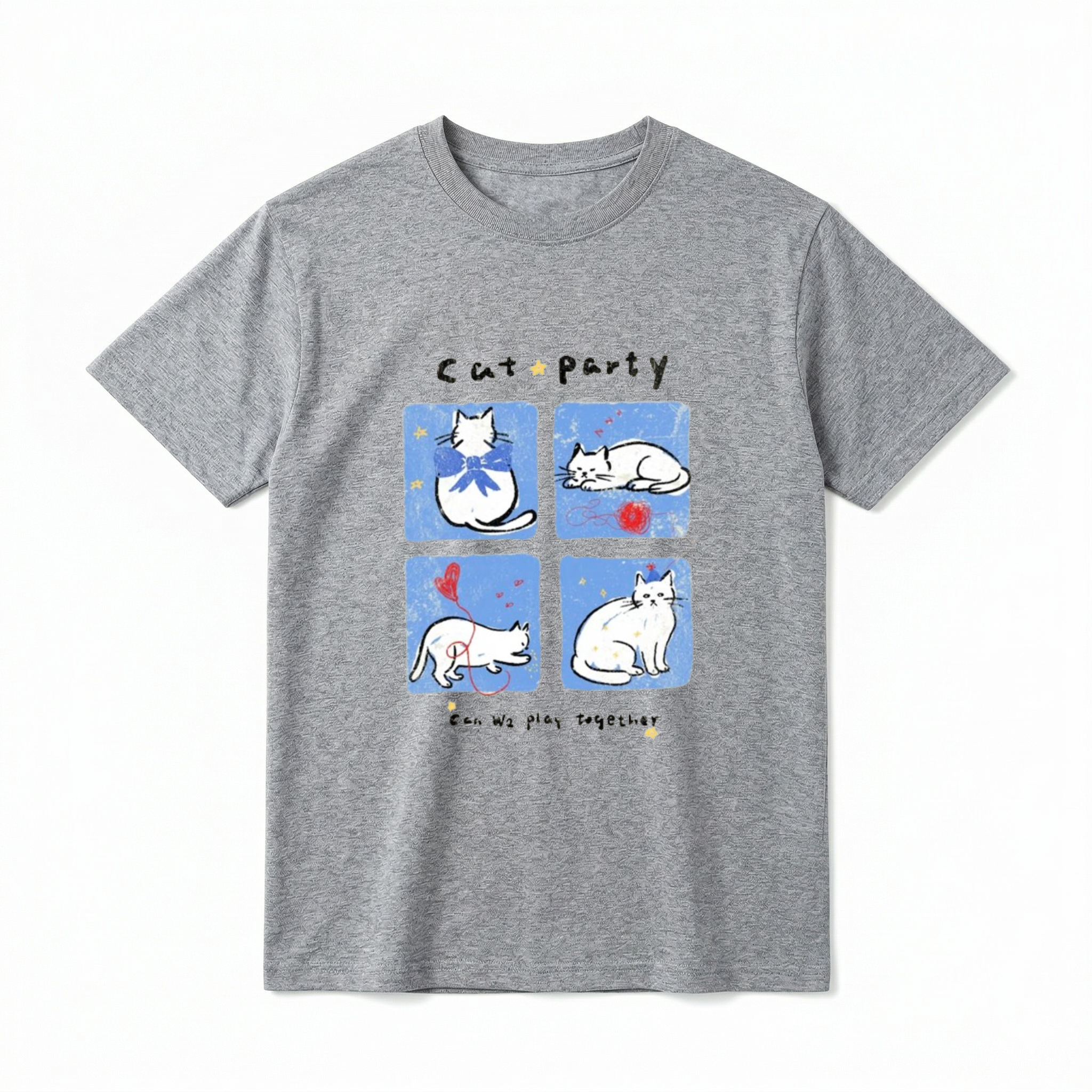 A flat lay of a short-sleeve t-shirt. The center graphic features the text "Cat party" above four blue squares showing white cartoon cats wearing bows, sleeping by red yarn, playing with a balloon, and wearing party hats. Below the panels is the text "Can We play together" surrounded by tiny yellow stars.