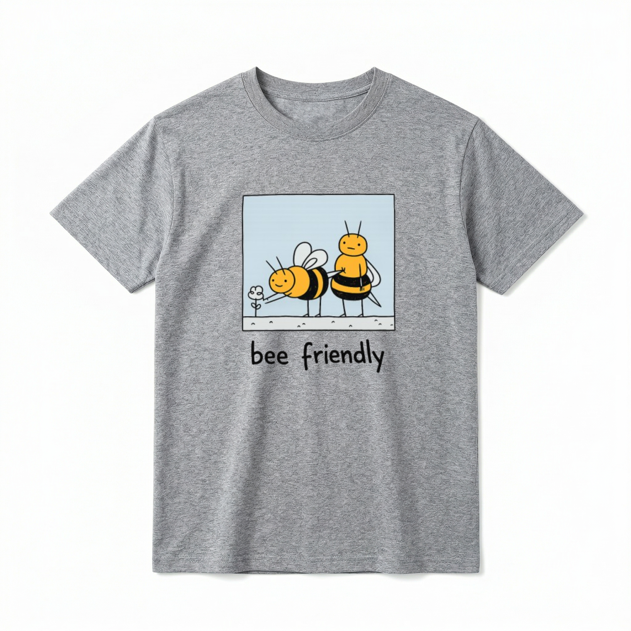 A flat lay of a short-sleeve t-shirt. The center chest features a hand-drawn cartoon graphic inside a light blue square border. Inside, two cute, chunky bees are drawn in a simple style. One bee is leaning forward to touch a tiny flower, while the other bee stands behind it with a blank, funny expression. Below the square graphic, the text reads "bee friendly" in a playful, casual black font.
