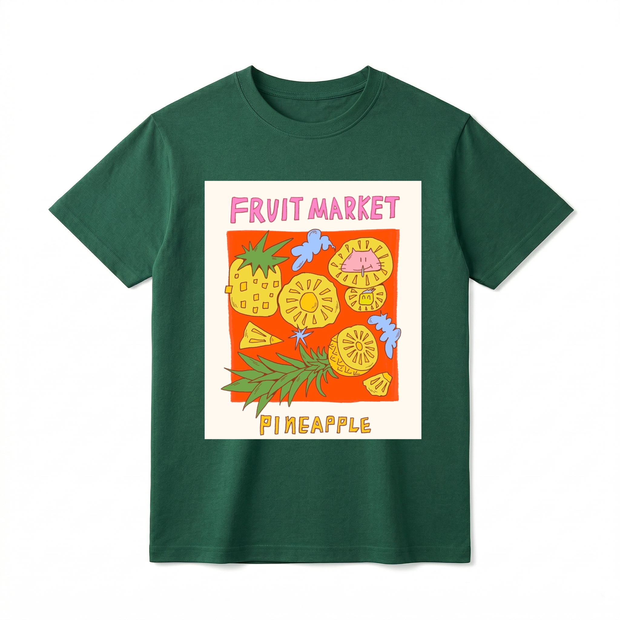 A detailed flat lay of a short-sleeve t-shirt. The center features a prominent graphic of a colorful, kitschy "Fruit Market" panel. The art includes a whole pineapple, various slices and wedges of pineapple, and abstract cloud shapes, with the text "FRUIT MARKET" at the top in pink font and "PINEAPPLE" at the bottom in yellow font.