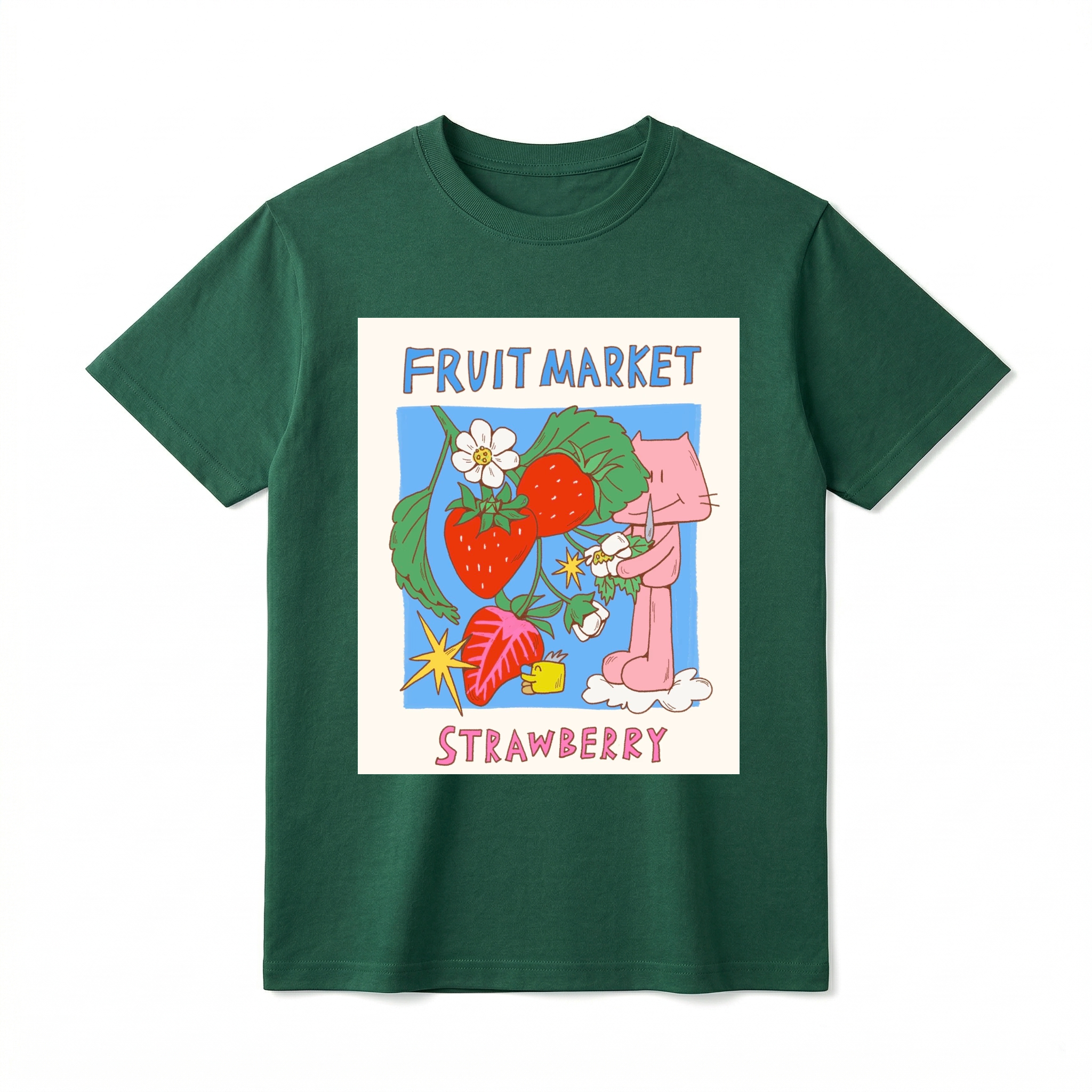A flat lay of a short-sleeve t-shirt. The center features a colorful graphic with the text "FRUIT MARKET" at the top in blue, hand-drawn letters. Below it is a light blue square containing illustrations of bright red strawberries on a leafy green vine with white blossoms, a sliced strawberry half, and a retro yellow starburst. On the right side, a cute pink cartoon cat stands on a small white cloud, holding a little flower. The word "STRAWBERRY" is printed at the bottom in bold pink text.
