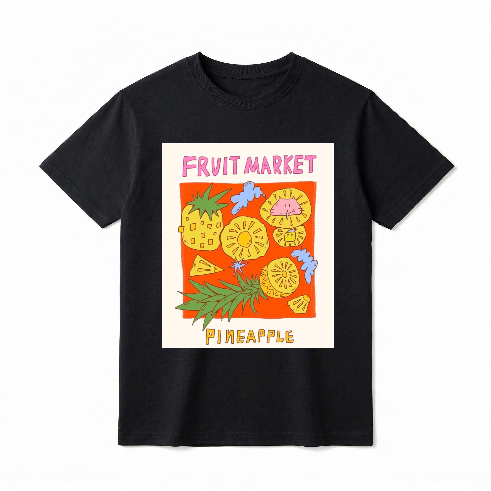 A detailed flat lay of a short-sleeve t-shirt. The center features a prominent graphic of a colorful, kitschy "Fruit Market" panel. The art includes a whole pineapple, various slices and wedges of pineapple, and abstract cloud shapes, with the text "FRUIT MARKET" at the top in pink font and "PINEAPPLE" at the bottom in yellow font.