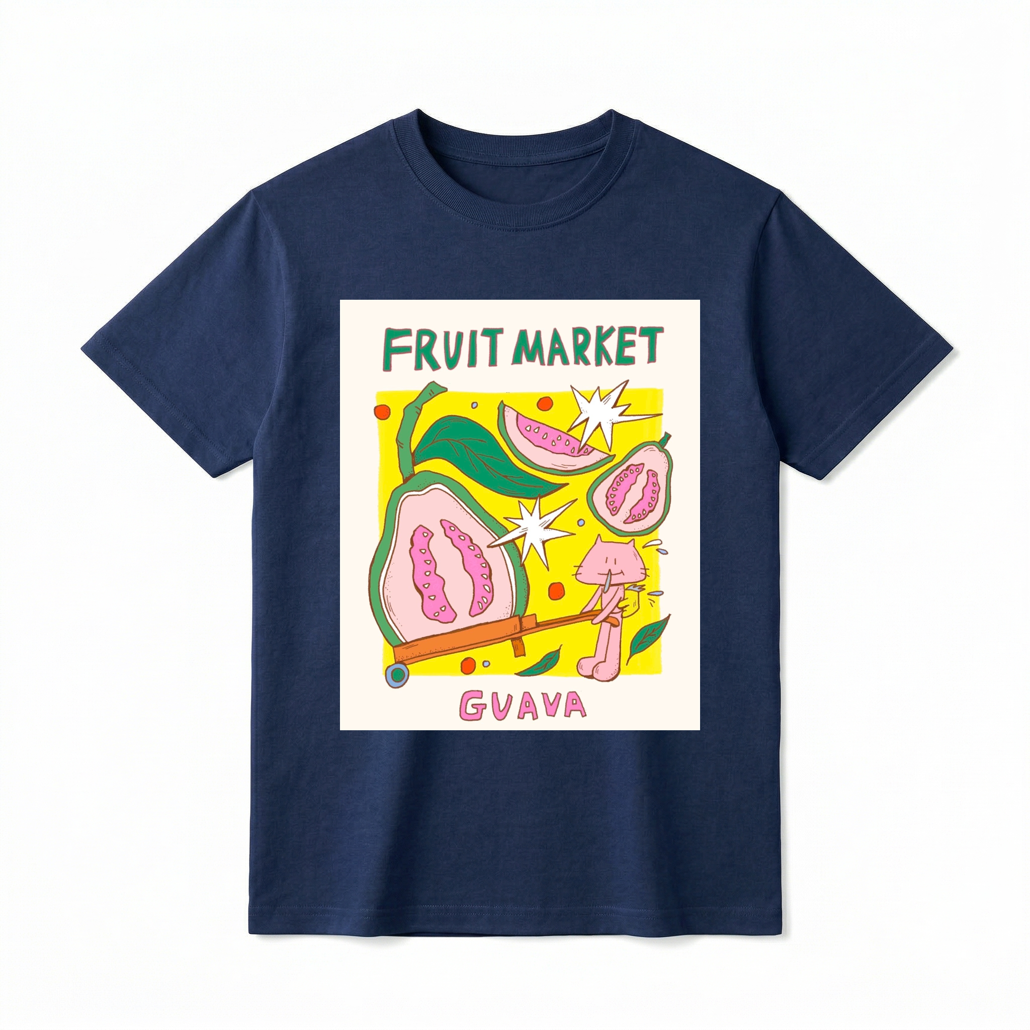 A flat lay of a short-sleeve t-shirt. The center features a colorful graphic with the text "FRUIT MARKET" at the top in green, hand-drawn letters. Below it is a yellow square containing illustrations of pink guavas, green leaves, and retro white starbursts. In the foreground, a cute pink cartoon cat is pushing a large half-slice of guava in an orange wheelbarrow. The word "GUAVA" is printed at the bottom in bold pink text.