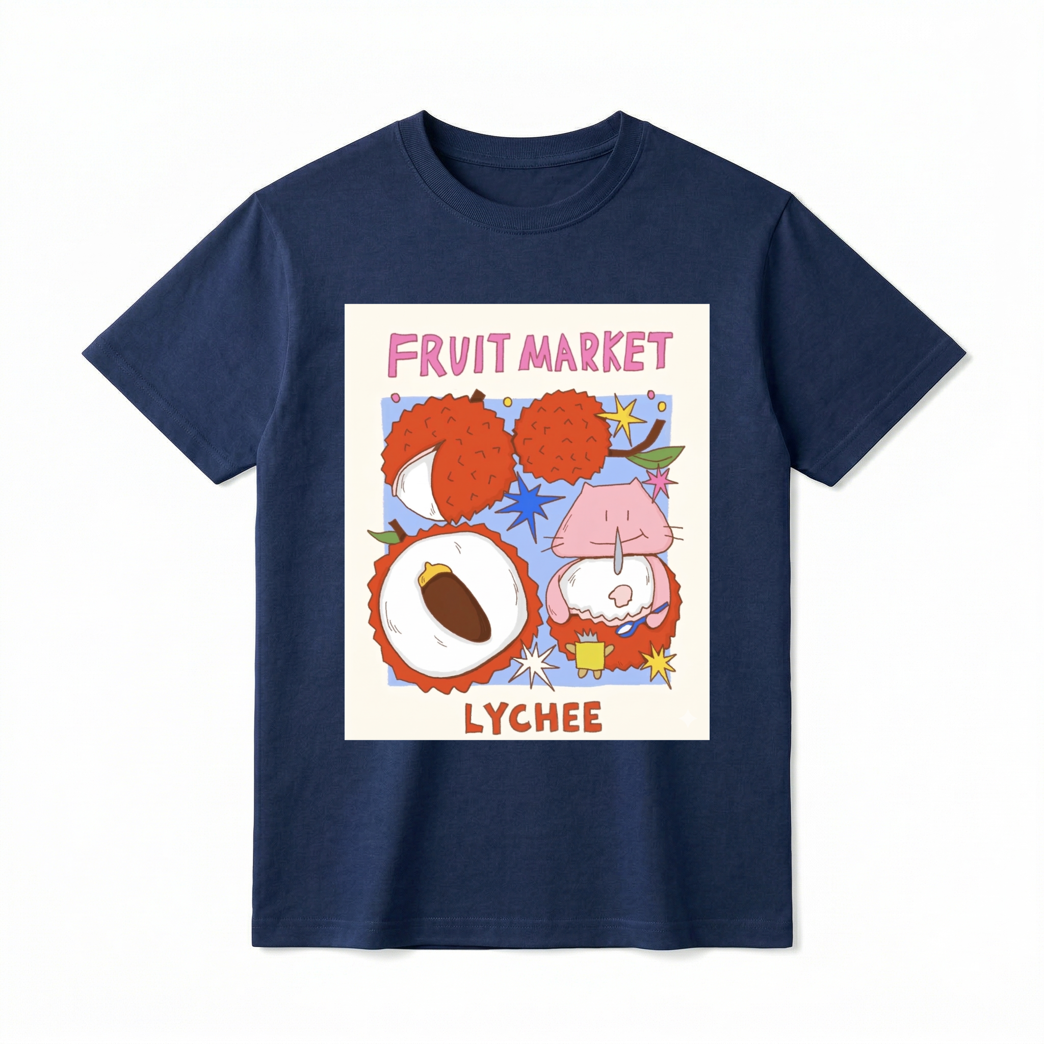 A flat lay of a short-sleeve t-shirt. The center features a colorful, square graphic with the text "FRUIT MARKET" at the top in bubbly pink letters. Below it are hand-drawn illustrations of red lychee fruits, including one sliced open to show the white flesh and brown pit, and another where a cute, round pink cartoon creature is sitting inside the lychee shell eating with a small spoon. The word "LYCHEE" is printed at the bottom in bold orange text.
