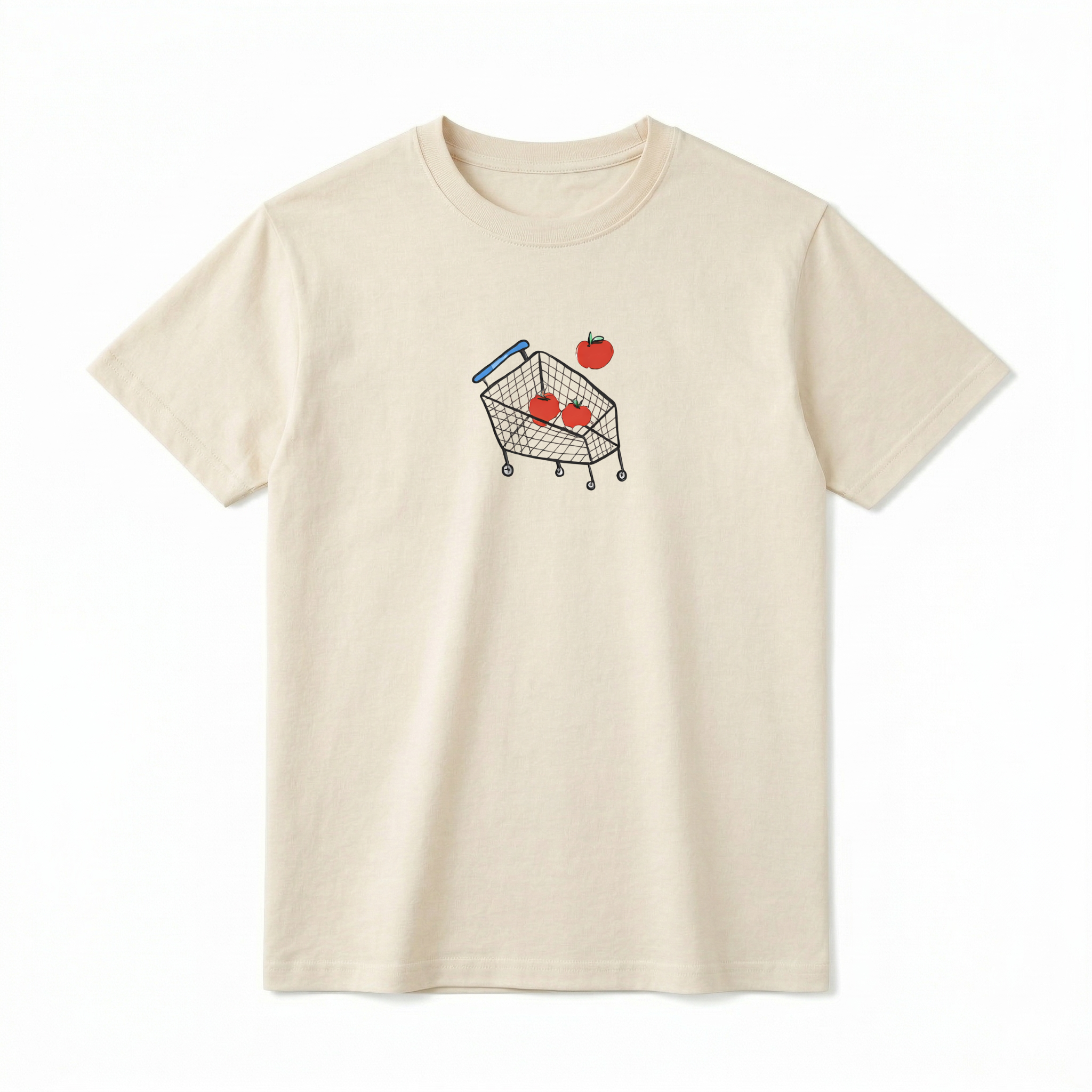 A flat lay of a short-sleeve t-shirt. The center chest features a minimalist, hand-drawn graphic of a wire shopping cart with a blue handle. Inside the cart are two bright red apples, with a third red apple floating just above the basket as if it is falling in.
