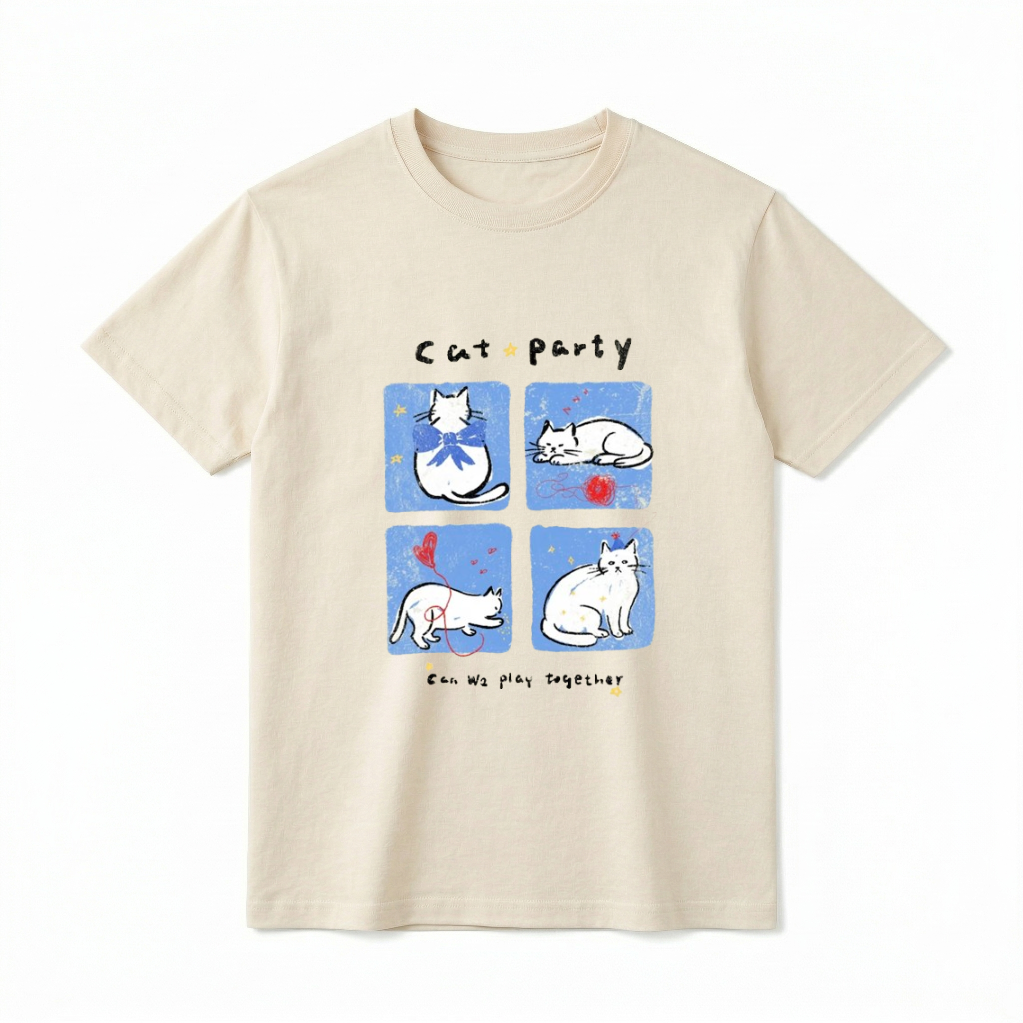 A flat lay of a short-sleeve t-shirt. The center graphic features the text "Cat party" above four blue squares showing white cartoon cats wearing bows, sleeping by red yarn, playing with a balloon, and wearing party hats. Below the panels is the text "Can We play together" surrounded by tiny yellow stars.