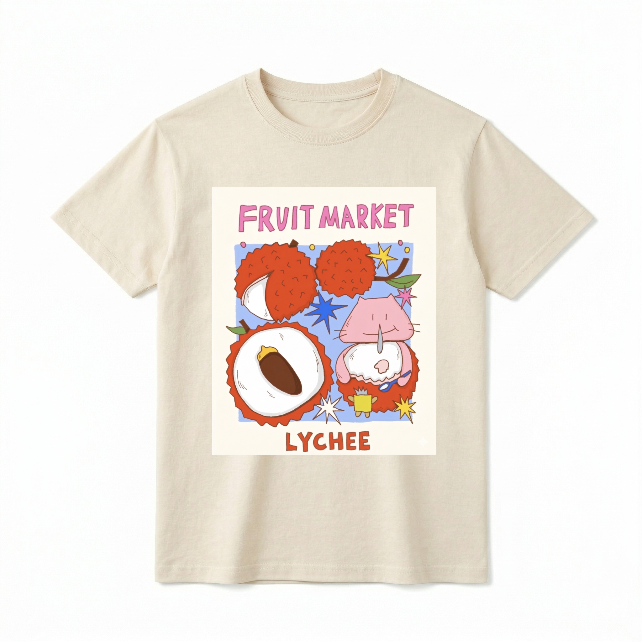 A flat lay of a short-sleeve t-shirt. The center features a colorful, square graphic with the text "FRUIT MARKET" at the top in bubbly pink letters. Below it are hand-drawn illustrations of red lychee fruits, including one sliced open to show the white flesh and brown pit, and another where a cute, round pink cartoon creature is sitting inside the lychee shell eating with a small spoon. The word "LYCHEE" is printed at the bottom in bold orange text.