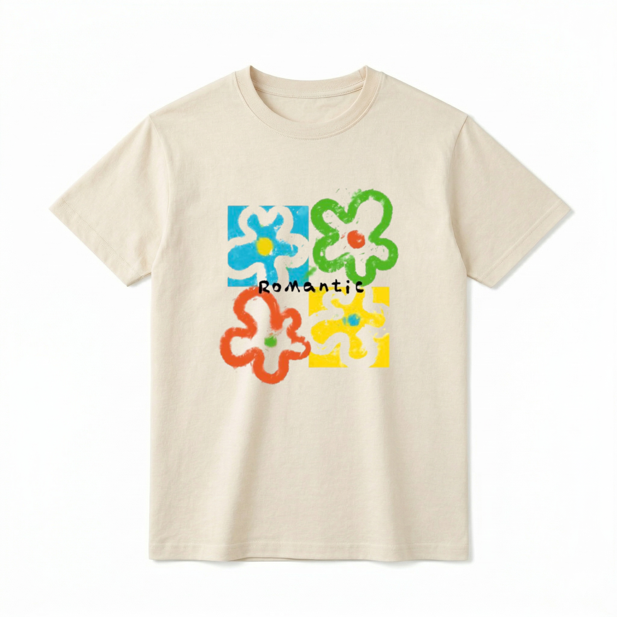 A flat lay of a short-sleeve t-shirt. The center graphic features a colorful, four-panel pop art grid with abstract, chunky flower outlines in blue, green, orange, and yellow. The word "Romantic" is printed directly across the middle of the flowers in a casual black font.