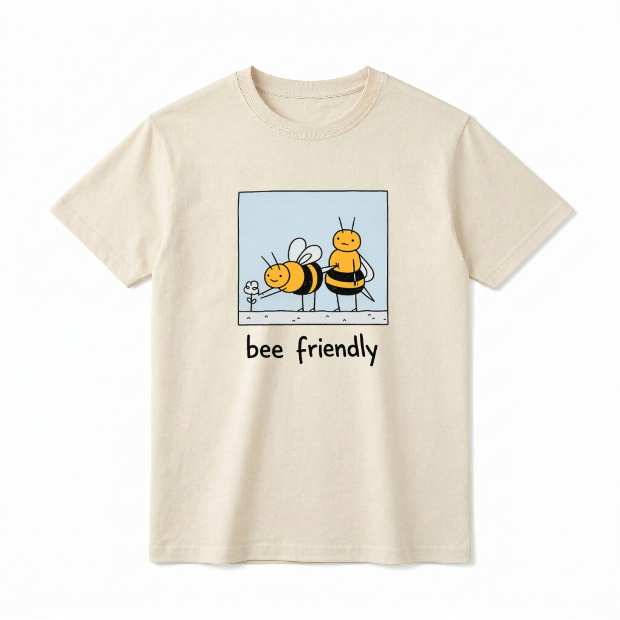 A flat lay of a short-sleeve t-shirt. The center chest features a hand-drawn cartoon graphic inside a light blue square border. Inside, two cute, chunky bees are drawn in a simple style. One bee is leaning forward to touch a tiny flower, while the other bee stands behind it with a blank, funny expression. Below the square graphic, the text reads "bee friendly" in a playful, casual black font.