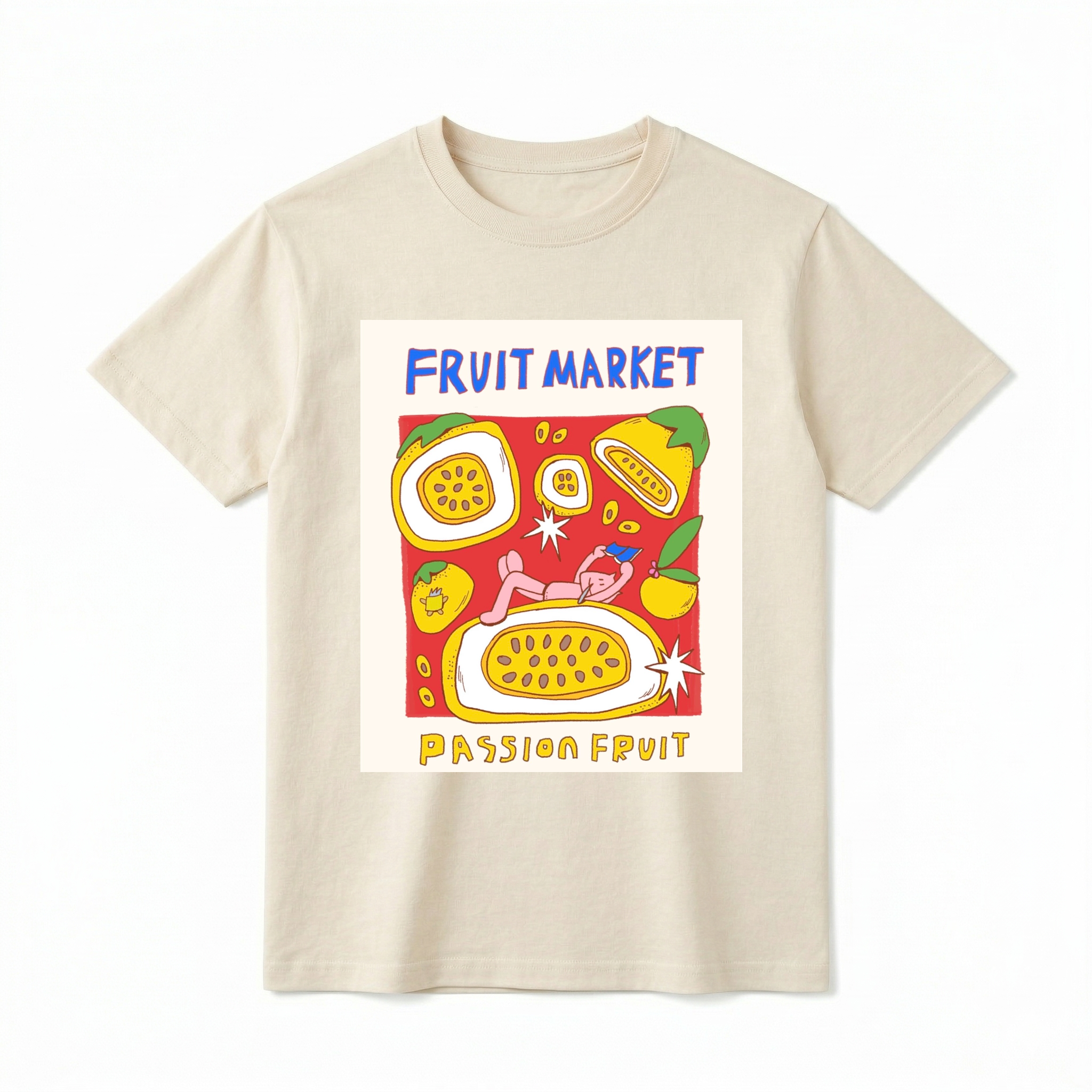 A cream-colored short-sleeve t-shirt with a central graphic. A slightly distressed, rectangular graphic panel with illustrations. At the top, "FRUIT MARKET" is in hand-drawn blue font. The panel shows detailed illustrations of three whole passion fruits and two sliced open passion fruits with visible seeds, complete with a small pink cartoon cat illustration inside the larger fruit. Below the panel, "PASSION FRUIT" is in hand-drawn yellow-brown font.