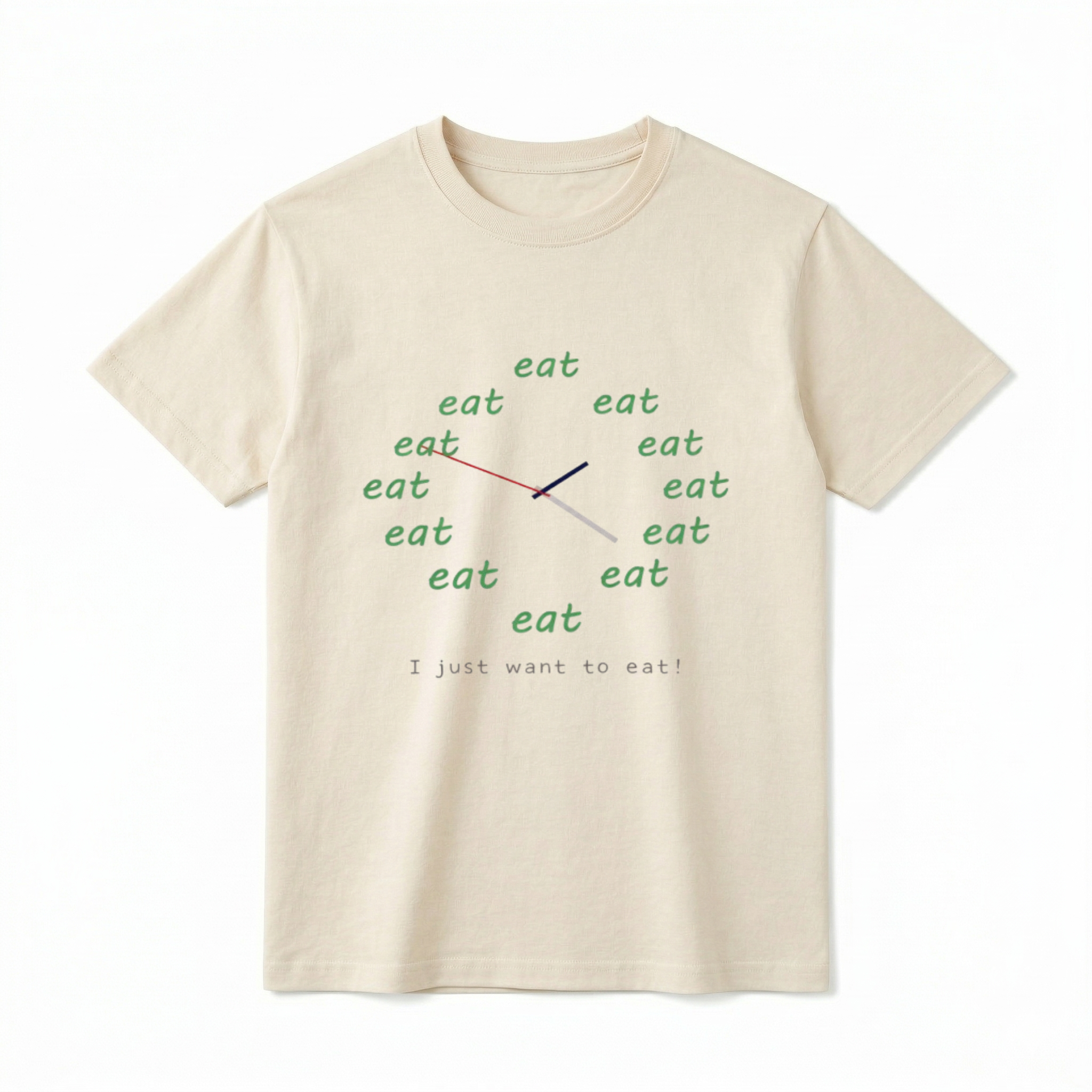 A flat lay of a short-sleeve t-shirt. The center chest features a graphic of a clock face made entirely of the word "eat" repeated twelve times in a green, casual font. Three clock hands (red, black, and grey) extend from the center. Below the clock, the text "I just want to eat!" is printed in a simple, gray typewriter-style font.