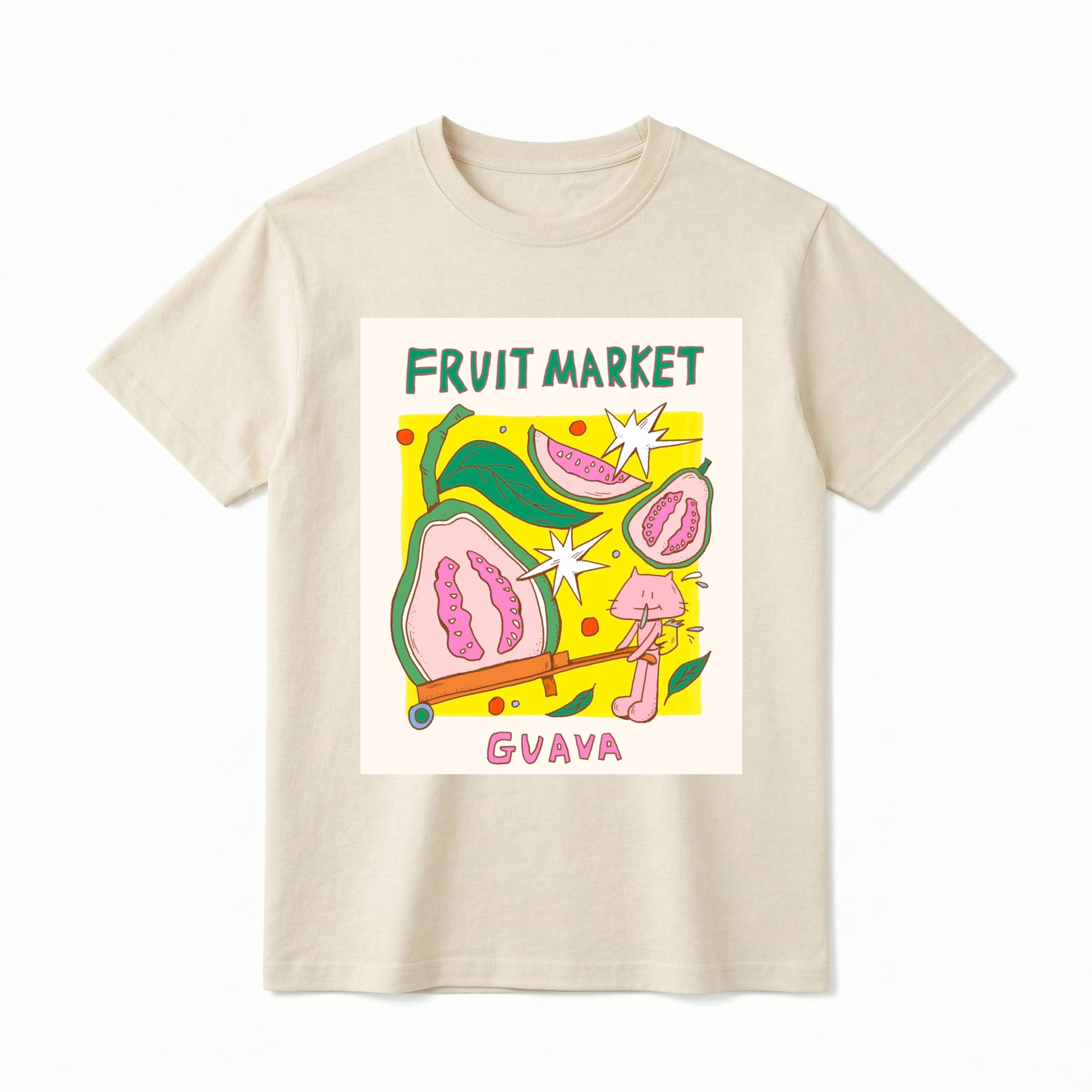 A flat lay of a short-sleeve t-shirt. The center features a colorful graphic with the text "FRUIT MARKET" at the top in green, hand-drawn letters. Below it is a yellow square containing illustrations of pink guavas, green leaves, and retro white starbursts. In the foreground, a cute pink cartoon cat is pushing a large half-slice of guava in an orange wheelbarrow. The word "GUAVA" is printed at the bottom in bold pink text.