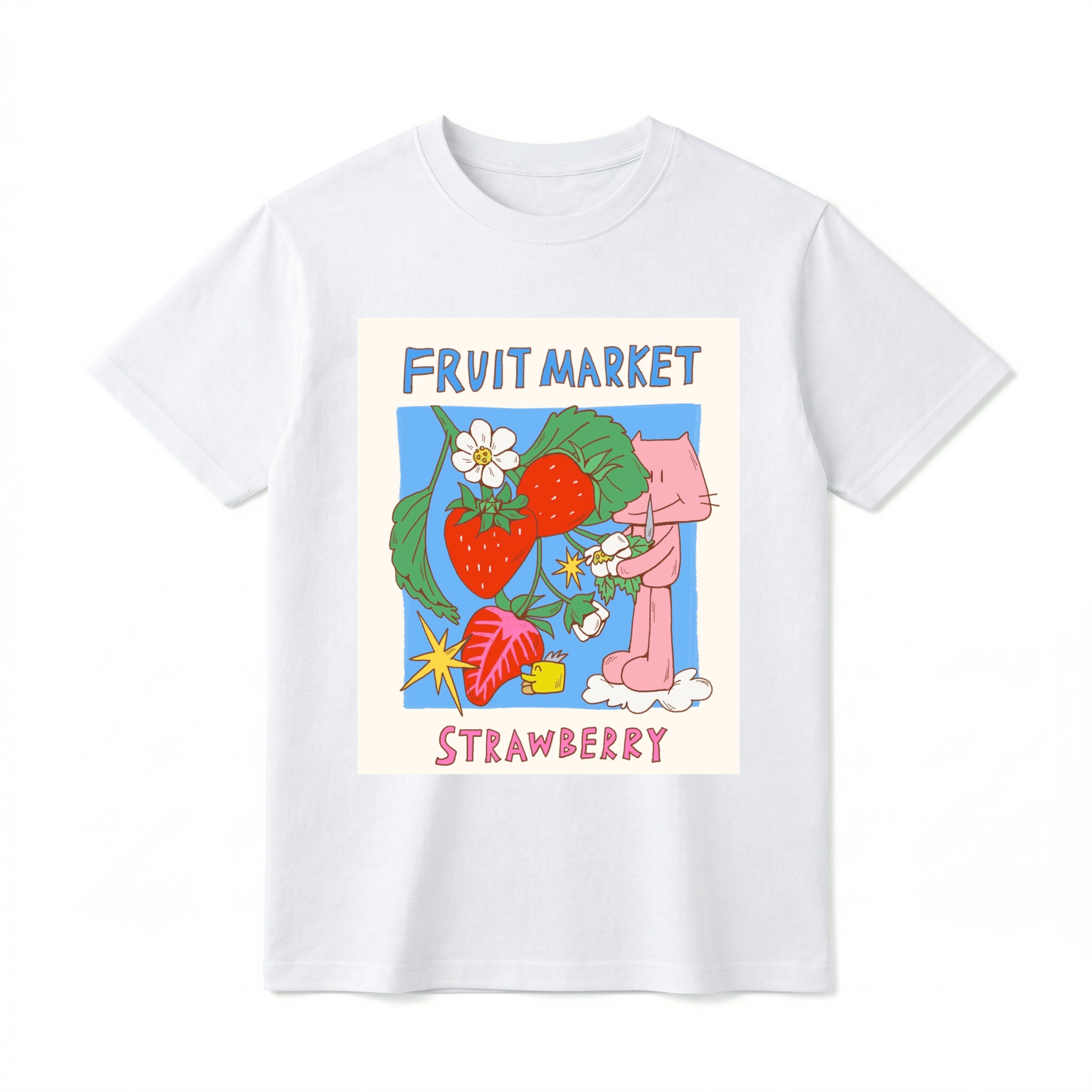 A flat lay of a short-sleeve t-shirt. The center features a colorful graphic with the text "FRUIT MARKET" at the top in blue, hand-drawn letters. Below it is a light blue square containing illustrations of bright red strawberries on a leafy green vine with white blossoms, a sliced strawberry half, and a retro yellow starburst. On the right side, a cute pink cartoon cat stands on a small white cloud, holding a little flower. The word "STRAWBERRY" is printed at the bottom in bold pink text.
