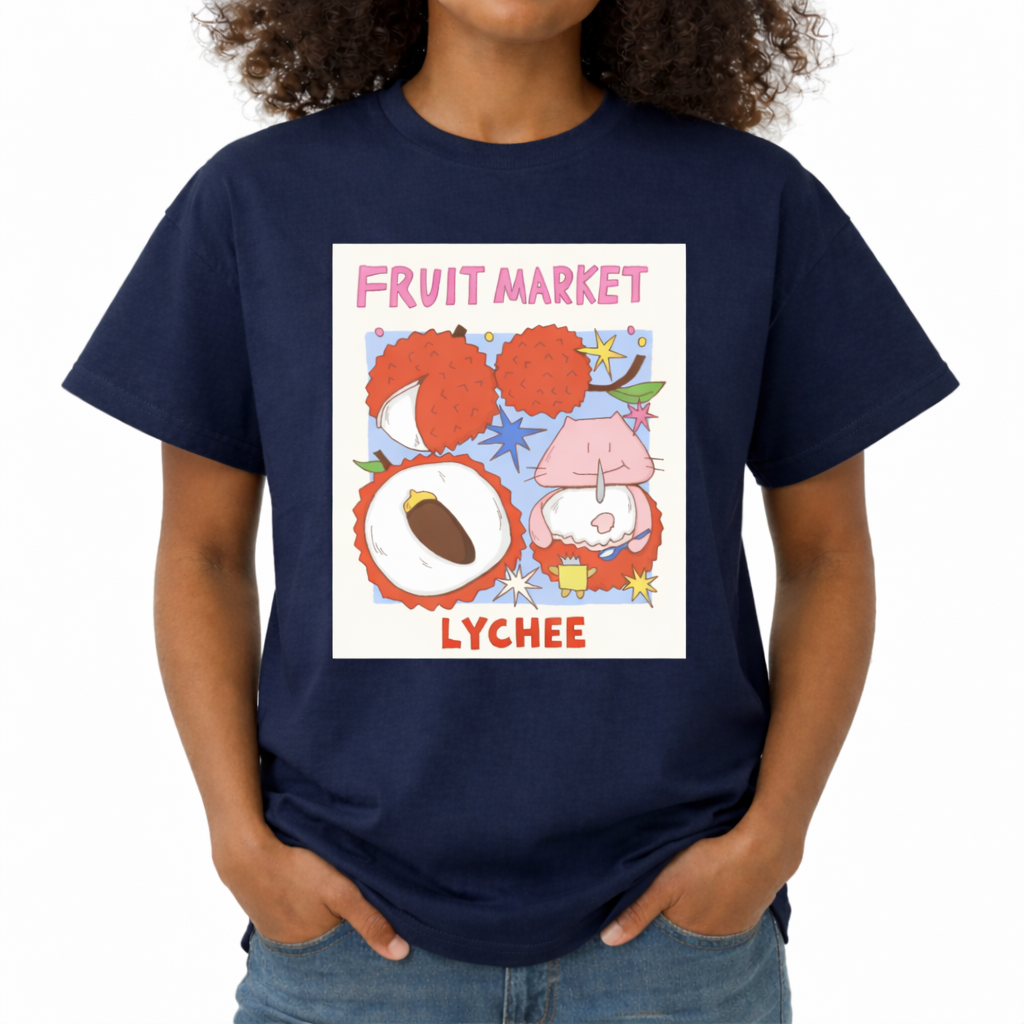 Navy blue t-shirt with 'Fruit Market Lychee' graphic design on a white background. The center features a colorful, square graphic with the text "FRUIT MARKET" at the top in bubbly pink letters. Below it are hand-drawn illustrations of red lychee fruits, including one sliced open to show the white flesh and brown pit, and another where a cute, round pink cartoon creature is sitting inside the lychee shell eating with a small spoon. The word "LYCHEE" is printed at the bot