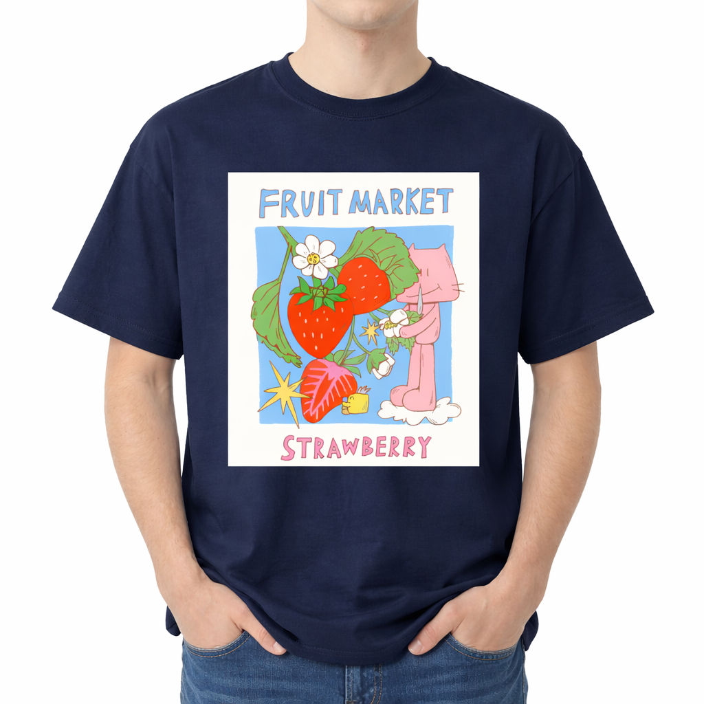 Navy blue t-shirt with a colorful 'Fruit Market Strawberry' graphic on a white background. The center features a colorful graphic with the text "FRUIT MARKET" at the top in blue, hand-drawn letters. Below it is a light blue square containing illustrations of bright red strawberries on a leafy green vine with white blossoms, a sliced strawberry half, and a retro yellow starburst. On the right side, a cute pink cartoon cat stands on a small white cloud, holding a little f